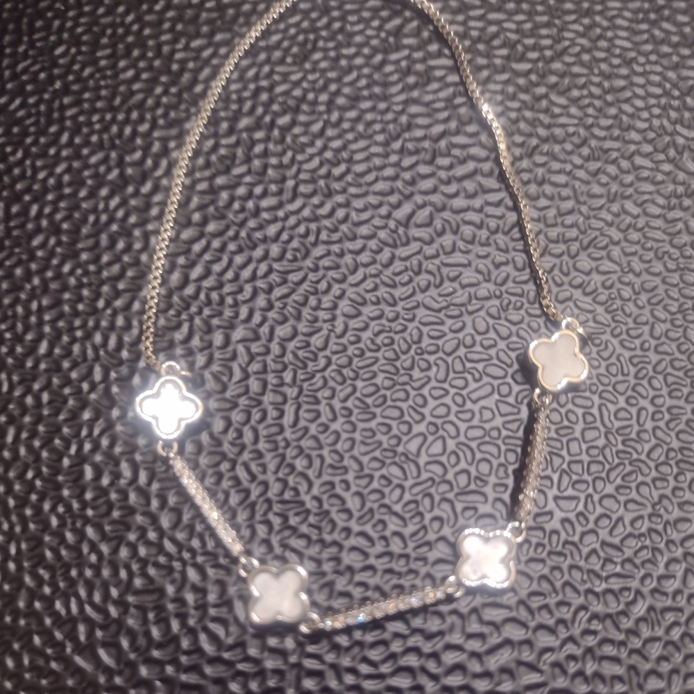 Elegant Silver Necklace with Floral Accents